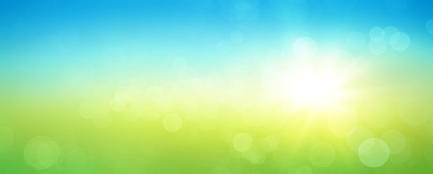 Fresh spring abstract background with bokeh and sun glow. Graphic element with blue and green horizontal colour gradients.