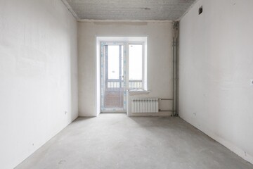 interior of the apartment without decoration in gray colors. rough finish