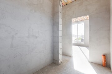 interior of the apartment without decoration in gray colors. rough finish