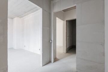 interior of the apartment without decoration in gray colors. rough finish