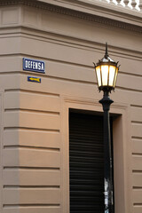 Illuminated lantern on the corner is one of the most well-known streets in the San Telmo...
