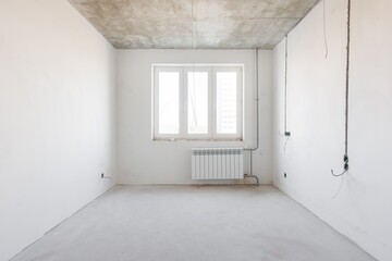 interior of the apartment without decoration in gray colors. rough finish