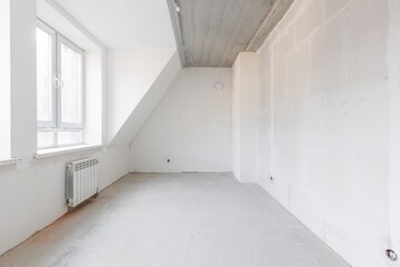 interior of the apartment without decoration in gray colors. rough finish