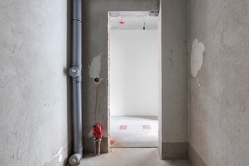 interior of the apartment without decoration in gray colors. rough finish