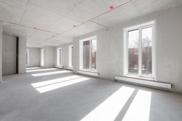 interior of the apartment without decoration in gray colors. rough finish