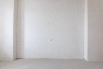 interior of the apartment without decoration in gray colors. rough finish