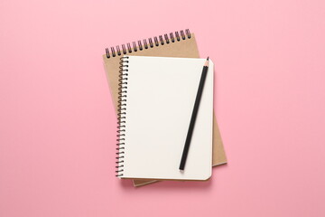 notebook on colored background