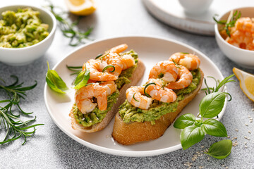 Shrimp and avocado sandwich with baguette and sesame
