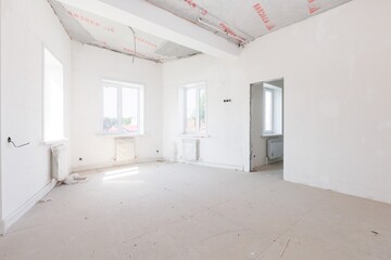 interior of the apartment without decoration in gray colors. rough finish