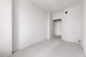 interior of the apartment without decoration in gray colors. rough finish