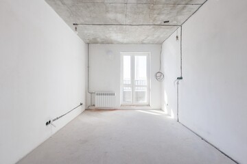 interior of the apartment without decoration in gray colors. rough finish