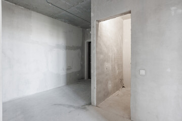 interior of the apartment without decoration in gray colors. rough finish