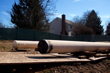 Natural gas liquids pipeline construction in a residential neighborhood using horizontal directional drilling.