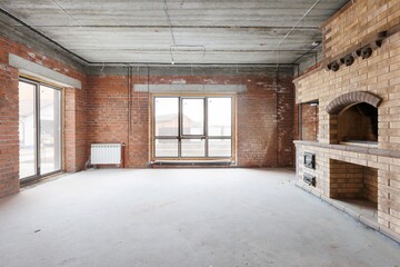 Fototapeta premium interior of the apartment without decoration in gray colors. rough finish