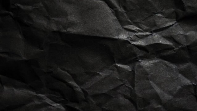 black crumpled paper background Stop animation Seamless loop