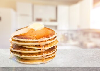 Tasty hot Pancakes stack with soft melting butter .