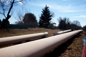 Natural gas liquids pipeline construction in a residential neighborhood using horizontal directional drilling.