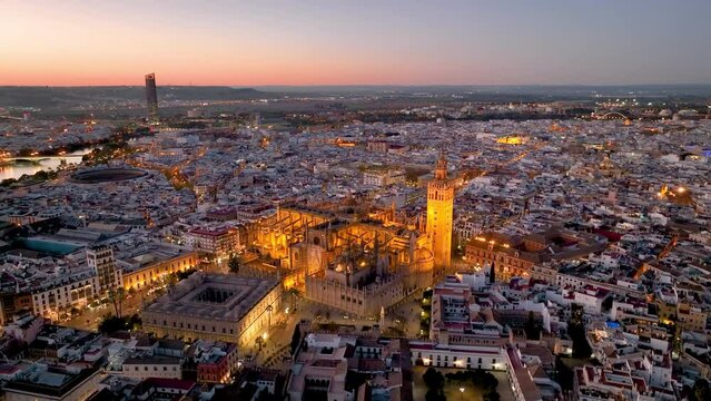 Seville with gothic cathedral and famous Giralda bell tower. Seville, Spain.