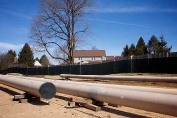 Natural gas liquids pipeline construction in a residential neighborhood using horizontal...