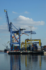 Fototapeta na wymiar cranes and containers in port