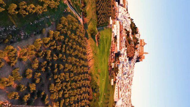 On White Village In Olvera, Province of Cadiz, Spain. Aerial vertical, vertical video background.