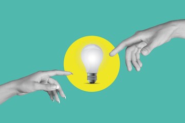 Human Hand reaching to light bulb