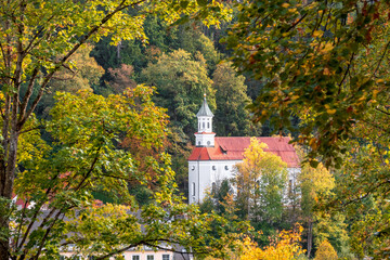 Fototapeta premium Blessed Virgin's Church on Mount at Fussen, Germany surrounded with trees.