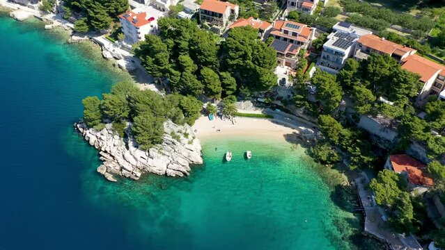 Amazing aerial view of the beautiful Podrace beach in Brela, Makarska Riviera, Croatia. Aerial view of Podrace beach and waterfront on Makarska riviera, Brela, Dalmatia region of Croatia.