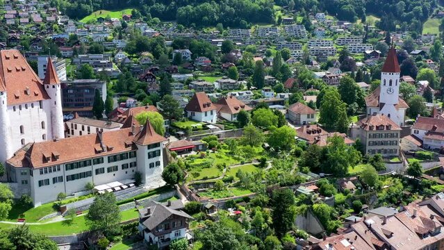 Panorama of Thun city with Alps and Thunersee lake, Switzerland. Historical Thun city and lake Thun with Bernese Highlands swiss Alps mountains in background, Canton Bern, Switzerland.