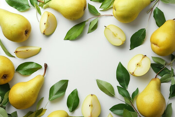 Frame of ripe yellow pears with leaves and fruit halves
