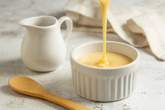 Fresh condensed milk in the bowl.