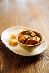 Delicious stew with croutons in restaurant - 705231407
