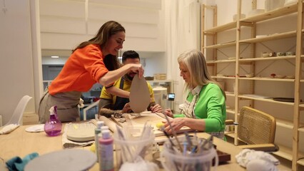 workshop view in ceramics classes with multigenerational students