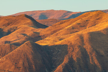 Beautiful sunset over the Caucasus mountains. Jeghenadzor, Armenia. - 705252656