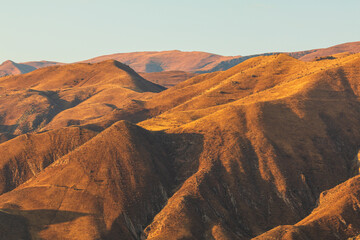 Beautiful sunset over the Caucasus mountains. Jeghenadzor, Armenia. - 705252857