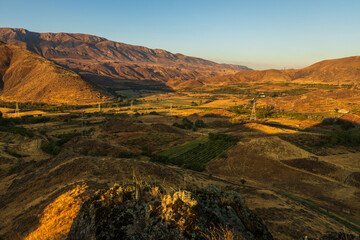 Beautiful sunset over the Caucasus mountains. Jeghenadzor, Armenia. - 705252894
