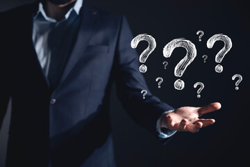 businessman hand question mark
