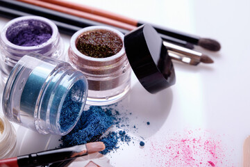 Professional cosmetics and brushes for make-up on a white background
