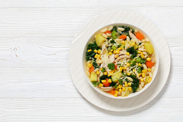 Chicken and white bean soup with veggies, corn