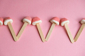 Four candy heart shape on pink background. High quality photo