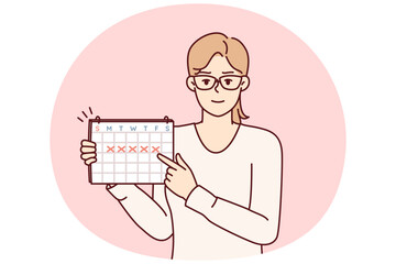 Young woman points finger at calendar with marks recommending time management or paying attention to date. Girl secretary in glasses announces important upcoming event. Flat vector illustration