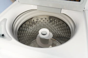 close up on top load washing machine
