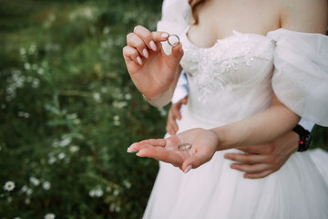 The image depicts a person holding their hands together 5204.