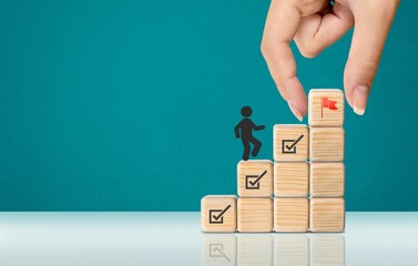 Work in progress, Goals, targets. Wooden blocks with icon.