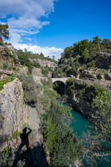 Transparent waters of Kopru River (Köprüçay, ancient Eurymedon) with its emerald green colour in Koprulu Canyon (Köprülü Kanyon) National Park, Antalya, Turkey. It's a rafting paradise
