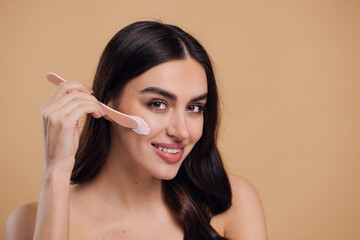 Half naked woman, face and brush cream for beauty