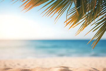 Fototapeta na wymiar Summer background, place for text, blurred tropical beach with palm leaf and bokeh