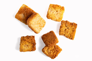 Heaps of delicious crispy fried croutons isolated on white, set