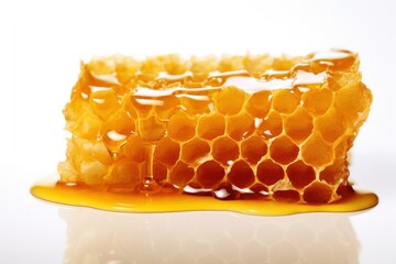Closeup of golden honeycomb, a natural and healthy product, showcasing the intricate hexagonal pattern and delicious sweetness.