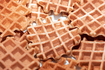 Belgian waffles on a white background . Homemade sweet eating 